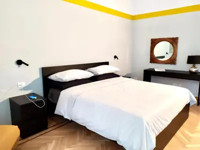 Letto o letti in una camera di NAPOLIXSUITE