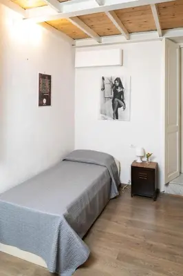 Letto o letti in una camera di Monaciello