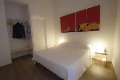 Letto o letti in una camera di Monaciello