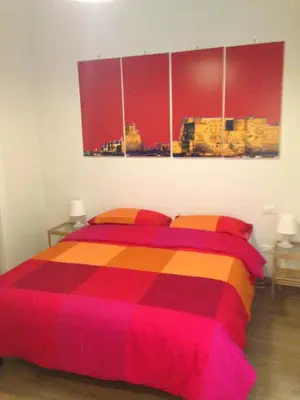 Letto o letti in una camera di Monaciello