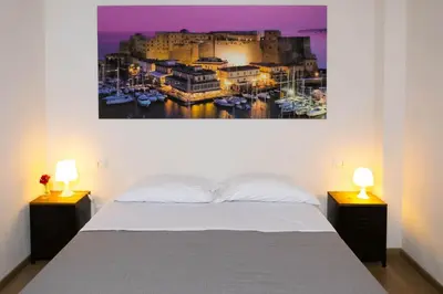 Letto o letti in una camera di Monaciello