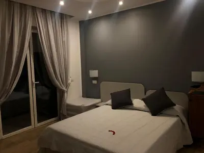 Letto o letti in una camera di B&b Bethel Napoli