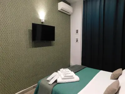TV o dispositivi per l'intrattenimento presso Scaramantico Rooms