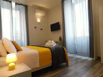 Letto o letti in una camera di Scaramantico Rooms