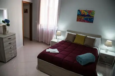 Letto o letti in una camera di Castel Capuano Flat By DomusExtra