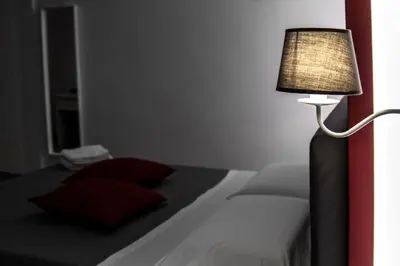 Letto o letti in una camera di Aurora Luxury Rooms