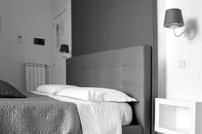 Letto o letti in una camera di Aurora Luxury Rooms