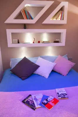 Letto o letti in una camera di Blumon House