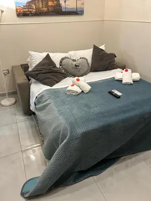 Letto o letti in una camera di B&B House Napoli Cavour