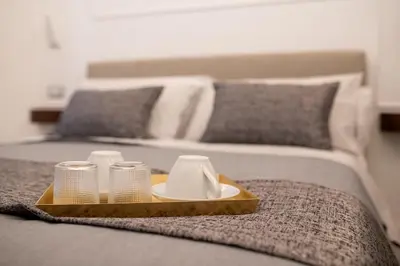 Letto o letti in una camera di FAGì Rooms In Naples