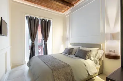Letto o letti in una camera di FAGì Rooms In Naples