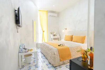 Letto o letti in una camera di Alma Adry