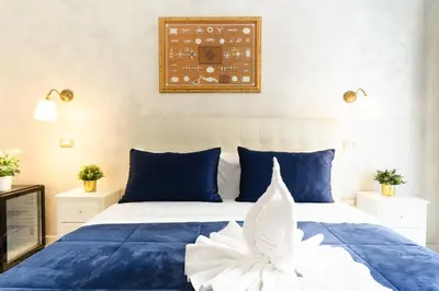 Letto o letti in una camera di Alma Adry