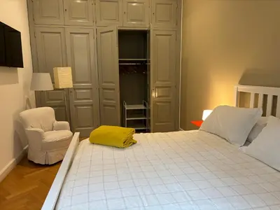 Letto o letti in una camera di NAPOLIFOREVER ELEGANT APARTMENT Casa Vacanze a Chiaia CENTRO