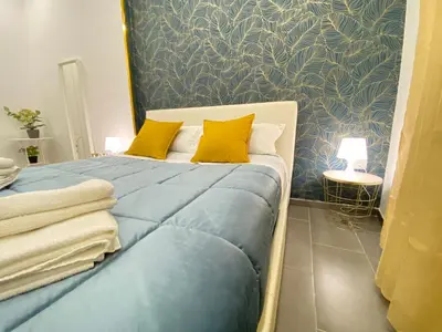 Letto o letti in una camera di Montesanto Dream apartment centro storico
