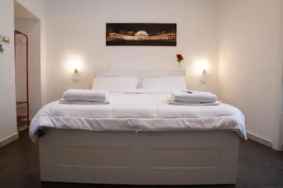 Letto o letti in una camera di AllYouCanTrip - La Nova