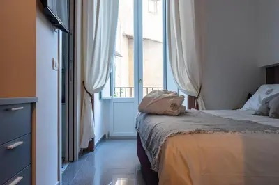 Letto o letti in una camera di Palazzo il Convento