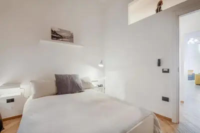 Letto o letti in una camera di Appartamento Moderno nel centro storico