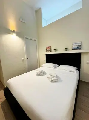 Letto o letti in una camera di Centro Storico Maison