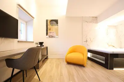 TV o dispositivi per l'intrattenimento presso Municipio Luxury Suite