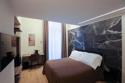 Letto o letti in una camera di Municipio Luxury Suite