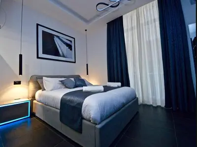 Letto o letti in una camera di Modern Apartment in Napoli + Balcony