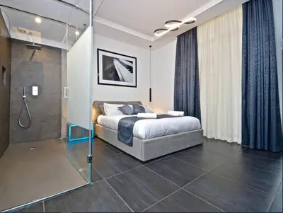 Letto o letti in una camera di Modern Apartment in Napoli + Balcony