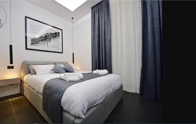 Letto o letti in una camera di Modern Apartment in Napoli + Balcony