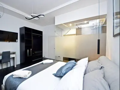 Letto o letti in una camera di Modern Apartment in Napoli + Balcony