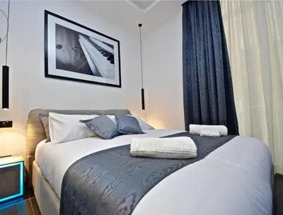 Letto o letti in una camera di Modern Apartment in Napoli + Balcony
