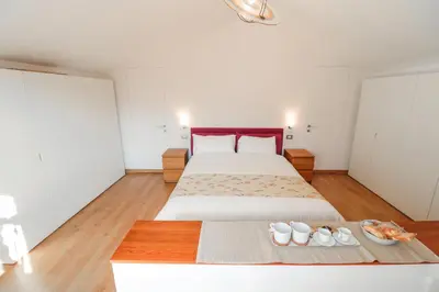 Letto o letti in una camera di Terrazze del Lungomare