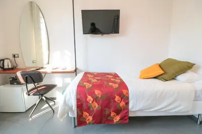 Letto o letti in una camera di Terrazze del Lungomare