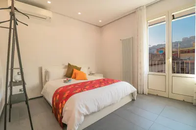 Letto o letti in una camera di Terrazze del Lungomare