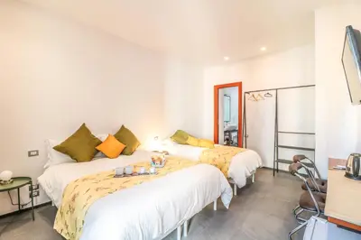 Letto o letti in una camera di Terrazze del Lungomare