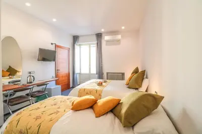 Letto o letti in una camera di Terrazze del Lungomare