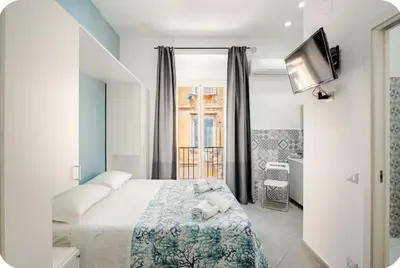Letto o letti in una camera di Duomo 34 Guest Room