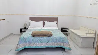 Letto o letti in una camera di A casa e Margarì