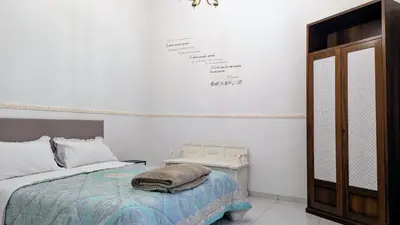 Letto o letti in una camera di A casa e Margarì