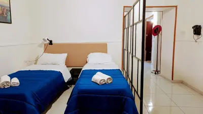 Letto o letti in una camera di A casa e Margarì