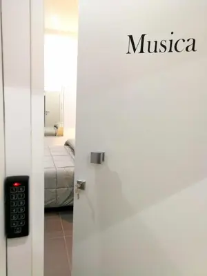 Letto o letti in una camera di Lombardi Luxury Home