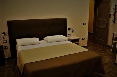 Letto o letti in una camera di Dei Gerolomini