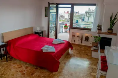 Letto o letti in una camera di La finestra sul golfo