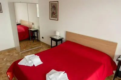 Letto o letti in una camera di La finestra sul golfo