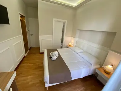 Letto o letti in una camera di MAMO al Museo