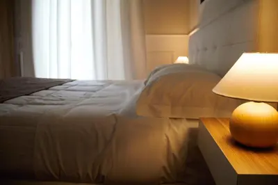 Letto o letti in una camera di MAMO al Museo