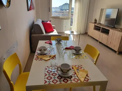 TV o dispositivi per l'intrattenimento presso NEAPOLITAN SKYSCRAPER APARTMENT