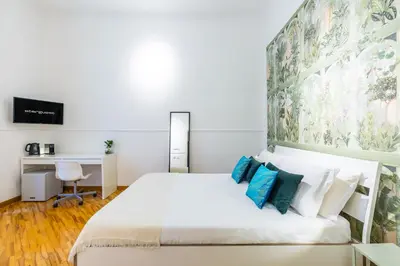Letto o letti in una camera di Starguest Dante