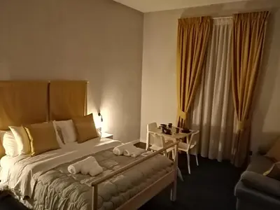 Letto o letti in una camera di Cabà bed&breakfast