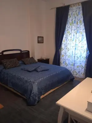 Letto o letti in una camera di WELL COME - Piazza Plebiscito