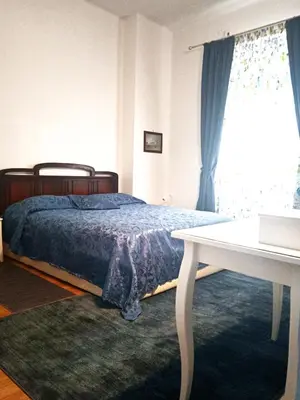 Letto o letti in una camera di WELL COME - Piazza Plebiscito